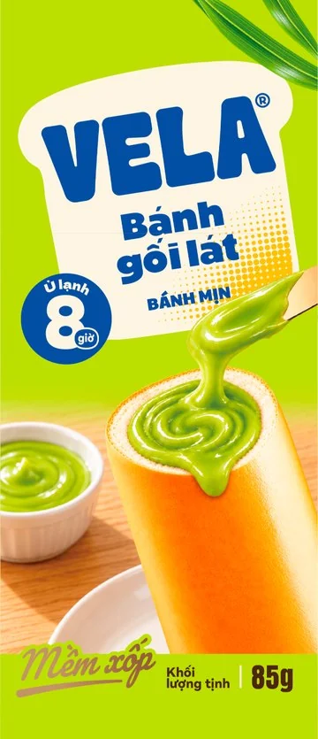 Mặt trước bao bì Bánh gối lát VELA vị lá dứa, bao bì màu xanh lá